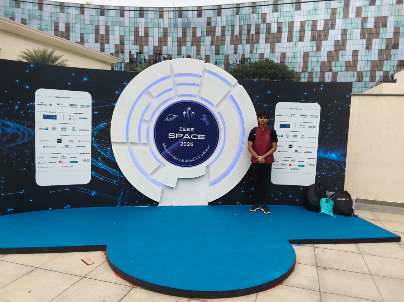Neil Akhawat at the IEEE SPACE 2026 backdrop in Bengaluru